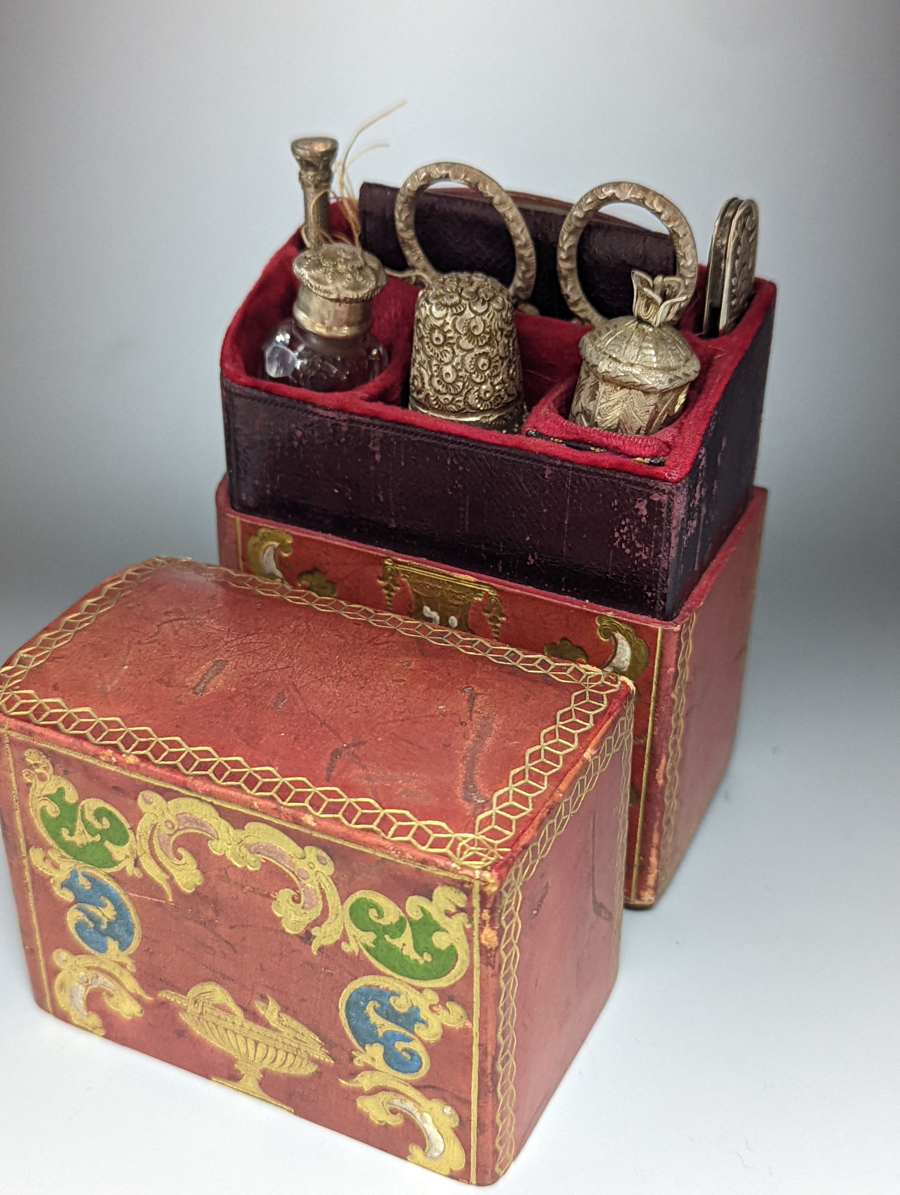 A Victorian lady’s seven-piece necessaire, with white metal mounts, in Morocco leather case, 10.5cm.
